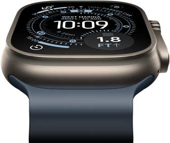 Apple Watch Ultra 3 tilted forward, natural titanium case, compass on Orienteering watch face, anchor blue Ocean Band
